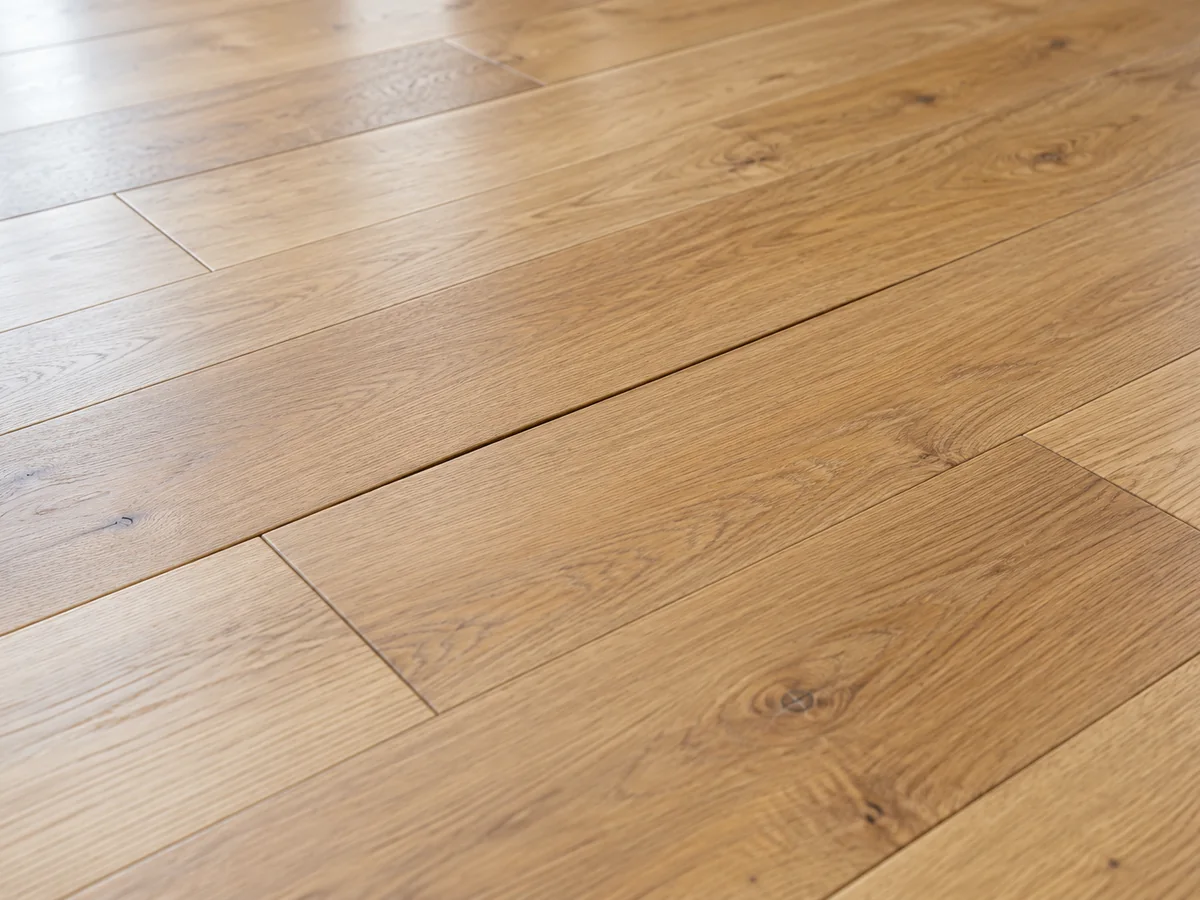 Oak floorboards with a narrow gap between boards